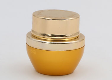 Os frascos cosméticos de vidro pequenos geados com tampas, pomada de vidro do ouro rangem o luxo